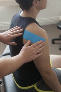 Oakland Chiropractor Shoulder Pain Treatment using Kinesiotape